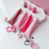 Tube à presser rose de 8g/15g de capacité Tube à lèvres brillant à lèvres vide crème à lèvres conteneur d'essence pour lèvres logo personnalisé pour emballage cosmétique