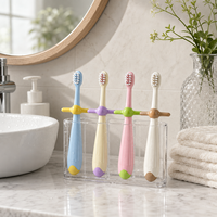 SAKURA Nouvelle conception Brosse à dents manuelle pour enfants à poils souples Protection des dents sensibles Manche en plastique Taille standard pour