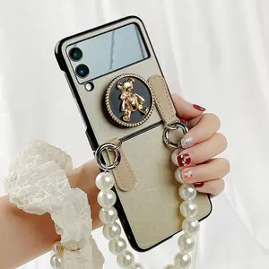 2022 Metal Case For Samsung Z Flip 3 Mobile Phone Cases Pearl Portable Chain Flip 4 Golden Bear Stand 5G Lanyard Korean Version