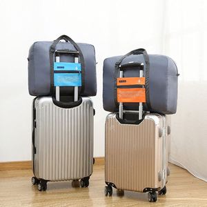 Sac de voyage pliable en nylon imperméable de style coréen, sac de rangement créatif pour avion, sac à roulettes, capacité 20-35L, respirant - Product Image 3