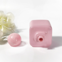 Vente en gros de flacons de parfum en verre rose de forme carrée, atomiseur de parfum, flacon d'huile essentielle, emballage de flacons de parfum de 100 ml