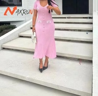 Robe d'été pour femme à manches courtes Style parfumé Robe tricotée A-Line Décoration à boutons Couleur unie Robe longue au sol