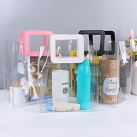 Vente en gros Pochette transparente en plastique PVC étanche pour femme Logo personnalisé de voyage Sac cosmétique transparent en PVC pour voyage
