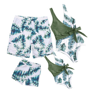 2024 nuovo costume da bagno genitore-bambino madre-figlia fionda Bikini cavo pantaloni da spiaggia da uomo genitore-bambino costume da bagno Set quattro pezzi - Product Image 1