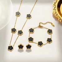 Conjunto de Tres Piezas de Moda en Acero Inoxidable con Trébol de Cinco Hojas de Doble Cara: Pulsera, Collar y Aretes para Mujer 2026