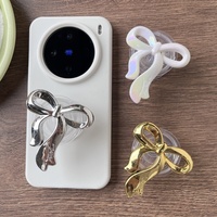 Nouvelle coque de téléphone magnétique créative en acrylique en forme de nœud avec support de préhension et support de bureau extensible style Instagram coréen pour iPhone