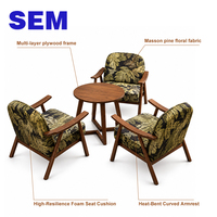 Ensemble de chaise d'appoint en tissu floral avec cadre en bois rétro SEM et table basse ronde pour café, restaurant et salon d'hôtel