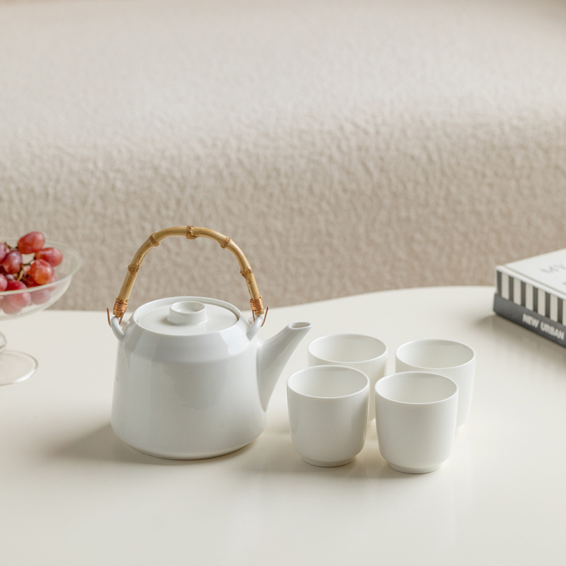 One teapot with 4 cups