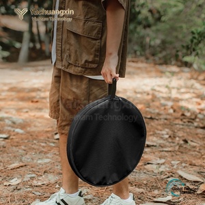Minimalist <b>Round</b> Outdoor <b>Table</b> With Storage Mesh Basket Tripod Base Engineered Wood Top Black Metal Frame - Product Image 2