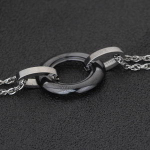 Pulsera de doble anillo de cerámica unisex, cadena geométrica en blanco y negro, joyería de regalo - Product Image 3