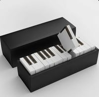 Boîte d'emballage en carton au design unique en forme de touches de piano avec mini-boîtes pour compte-gouttes d'huiles essentielles