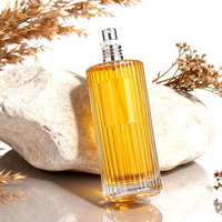 Bouteille en verre de parfum de haute qualité à rayures verticales de grande capacité de 150ml avec pulvérisateur en aluminium