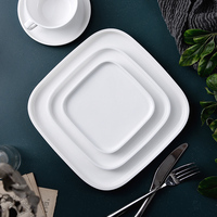 Ensemble de table de dîner de restaurant moderne haut de gamme Grandes assiettes carrées en porcelaine blanche Ensemble de couverts Assiettes d'usine