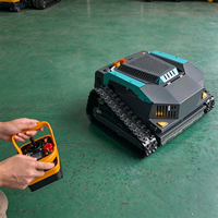 Tondeuse à gazon électrique télécommandée sur chenilles avec deux moteurs de traction de 800 W, une plateforme de 700 mm et un générateur de 2500 W