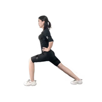 Combinaison EMS sèche portable pour le tonification musculaire et la récupération en déplacement