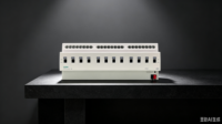 Actionneur de commutation KNX 12 voies 230V AC, montage sur rail DIN, protection IP20, capacité de coupure 10A pour la domotique et l'automatisation des bâtiments
