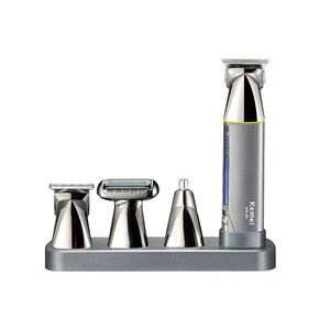 Tondeuse à cheveux électrique Kemei 4 en 1, modèle KM 801, corps métallique, rechargeable par USB, pour usage domestique, avec tondeuse pour le nez et accessoires. - Product Image 4