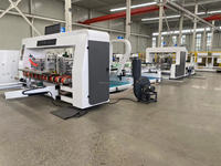 Machine automatique de pliage et de collage de boîtes en carton ondulé