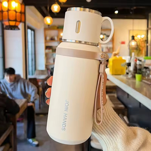 Bouteille d'eau isotherme portable grande capacité en acier inoxydable avec couvercle pour le sport - Product Image 4
