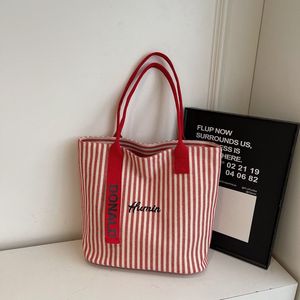Nouveau sac en toile grande capacité pour femmes, sac à bandoulière polyvalent à rayures, sac fourre-tout pour étudiantes - Product Image 3