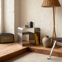 Table basse moderne minimaliste en acier inoxydable argenté avec rangement pour salon et usage domestique