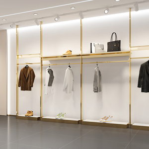 Exhibidor de Ropa para Hombre, Diseño Dorado, Mueble de Acero Inoxidable, Columna Superior de Pared, Estante Simple para Tienda de Ropa - Product Image 1