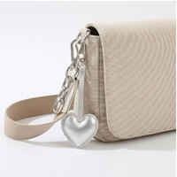 Breloque de sac en cuir PU avec nœud papillon argenté et étoile, porte-clés tendance, pendentif pour sac à main, accessoires pour femmes