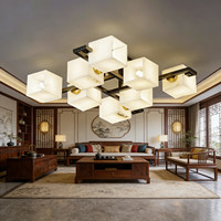 Lampe suspendue LED personnalisée en laiton et pierre, blanc chaud (3500K), design rond à intensité variable pour l'éclairage du salon