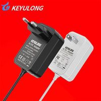 Adaptateur secteur DC 12V 3A/9V 3A/15V 2A/24V 1.5A multi-prises US EU UK en matériau PC noir et blanc pour bandes LED et moniteurs, certifié FCC CE UKCA