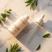 Flacon cosmétique de luxe or et blanc avec pompe pulvérisatrice 30 ml pour shampoing et lotion