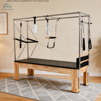 Máquinas de Pilates Reformer de doble uso, modelo Cadillac de roble con barra de rodadura para entrenamiento en pareja