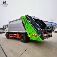 Camion compacteur de déchets HEAVSTY Diesel Euro 6 4x2, boîte de vitesses manuelle 8 rapports, pneus 10.00R20, ABS, double réservoir d'égouts 6200ml