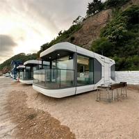 Maison capsule intelligente préfabriquée personnalisée de 1 et 2 chambres avec commande vocale AI, fenêtre panoramique et commodités complètes