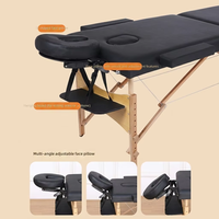 Table de massage portable pliable multifonctionnelle en bois de hêtre au design moderne et minimaliste, modèle 2026