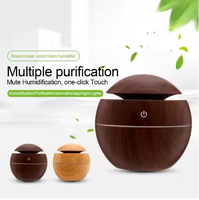 Humidificateur d'air portable en gros d'usine, mini humidificateur purificateur ultrasonique à grain de bois rond LED 130 ml, diffuseur d'arômes