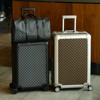 Valise de voyage rigide en alliage d'aluminium, élégante, durable, légère, classique et simple, idéale pour les affaires et la mode.