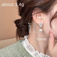 Boucles d'oreilles pendantes de luxe léger ZhuQian pour femmes, avec zircone cubique étincelante, idéales pour les soirées dansantes, bijoux délicats