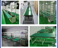 Ligne d'assemblage de bande transporteuse d'occasion Chaîne réglable Table de connexion Tri alimentaire d'atelier Convoyeur incliné Chaîne de machine à tourner