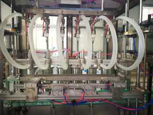 Línea automática de máquina de llenado y tapado de botellas de aceite de motor de lubricante líquido refrigerante anticongelante de galón de basura lineal - Product Image 4