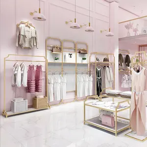 Support d'affichage pour boutique de vêtements personnalisés, en acier inoxydable, doré brillant, pour les magasins de vêtements - Product Image 1