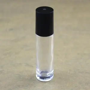 Clear glass 10 ml roll on bottle with black plastic cap and metal roller ball