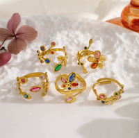 Nouveautés en gros : Bague feuille en acier inoxydable plaqué or 18 carats avec zircon arc-en-ciel pour femme