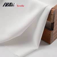 Koshibo 100% tela textil de poliéster para ropa blanca transpirable tejido resistente al desgarro teñido liso ligero para vestidos sólidos