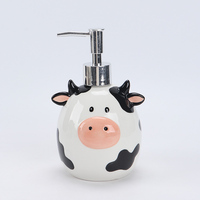 Adorable pot de rangement en céramique en forme de vache avec des taches noires et un nez rose pour ranger des biscuits, des bonbons ou de petits articles de cuisine
