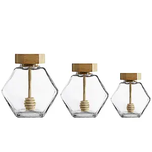 Hoge Kwaliteit 100Ml 220Ml 380Ml Zeshoekige Transparante Glazen Honingpot Glazen Opslagfles Met Bamboe Afdekking Roerstaaf