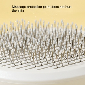 หวีแปรงขนสัตว์เลี้ยง สำหรับสุนัขและแมว ช่วยขจัดขนหลุดร่วง ทำความสะอาดขนที่พันกัน ใช้งานง่ายเพียงคลิกเดียว พร้อมฟังก์ชั่นนวด - Product Image 4