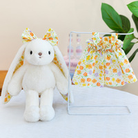 Peluche Lapin à longues oreilles et jupe fleurie, très tendance, rembourrage en coton PP, unisexe, poupée Lapin timide, cadeau pour fille, vente en gros