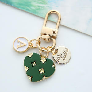 Nouveau amour alliage porte-clés mignon fleur coeur lettre cercle marque métal pendentif écouteur couverture sac suspendus ornements - Product Image 6