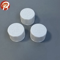 Bouchon CR de liquide oral en plastique résistant à la température de 28mm pour bouteille en verre ambré avec caractéristiques anti-trempe