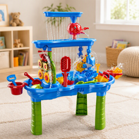 Table d'eau multi-niveaux en plastique bleu pour enfants, idéale pour les jeux de plage en extérieur avec sable et accessoires